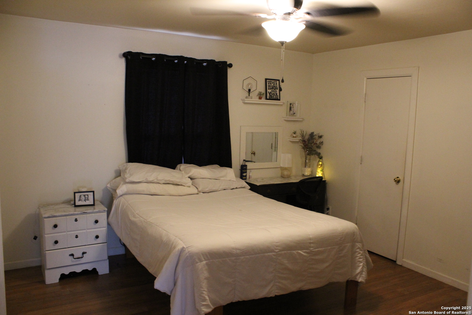406 County Road 6850, Unit 1 Lytle, TX 78052 - Photo 14 of 24 a bedroom with a bed and a closet