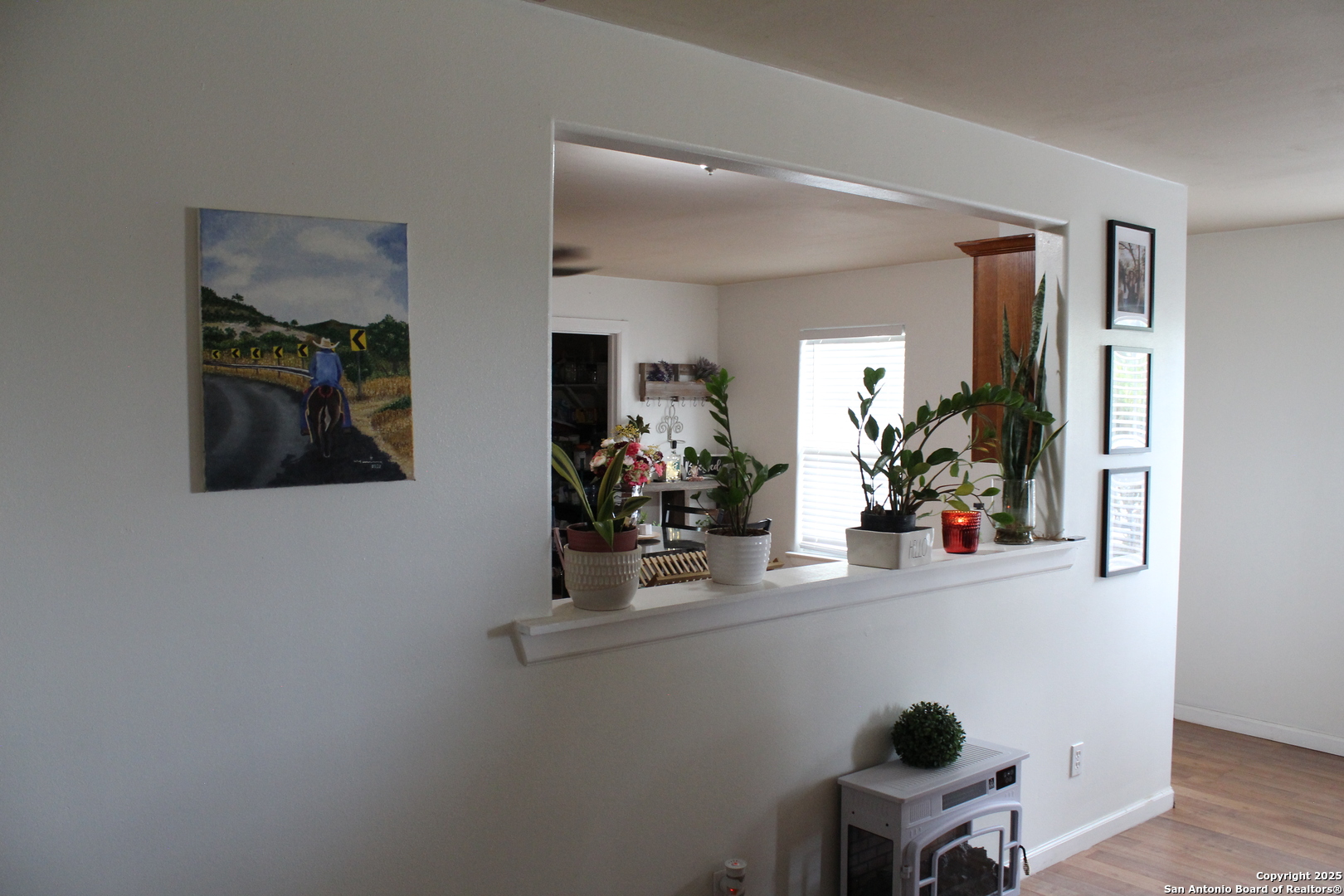 406 County Road 6850, Unit 1 Lytle, TX 78052 - Photo 20 of 24 a room with a wooden floor and furniture
