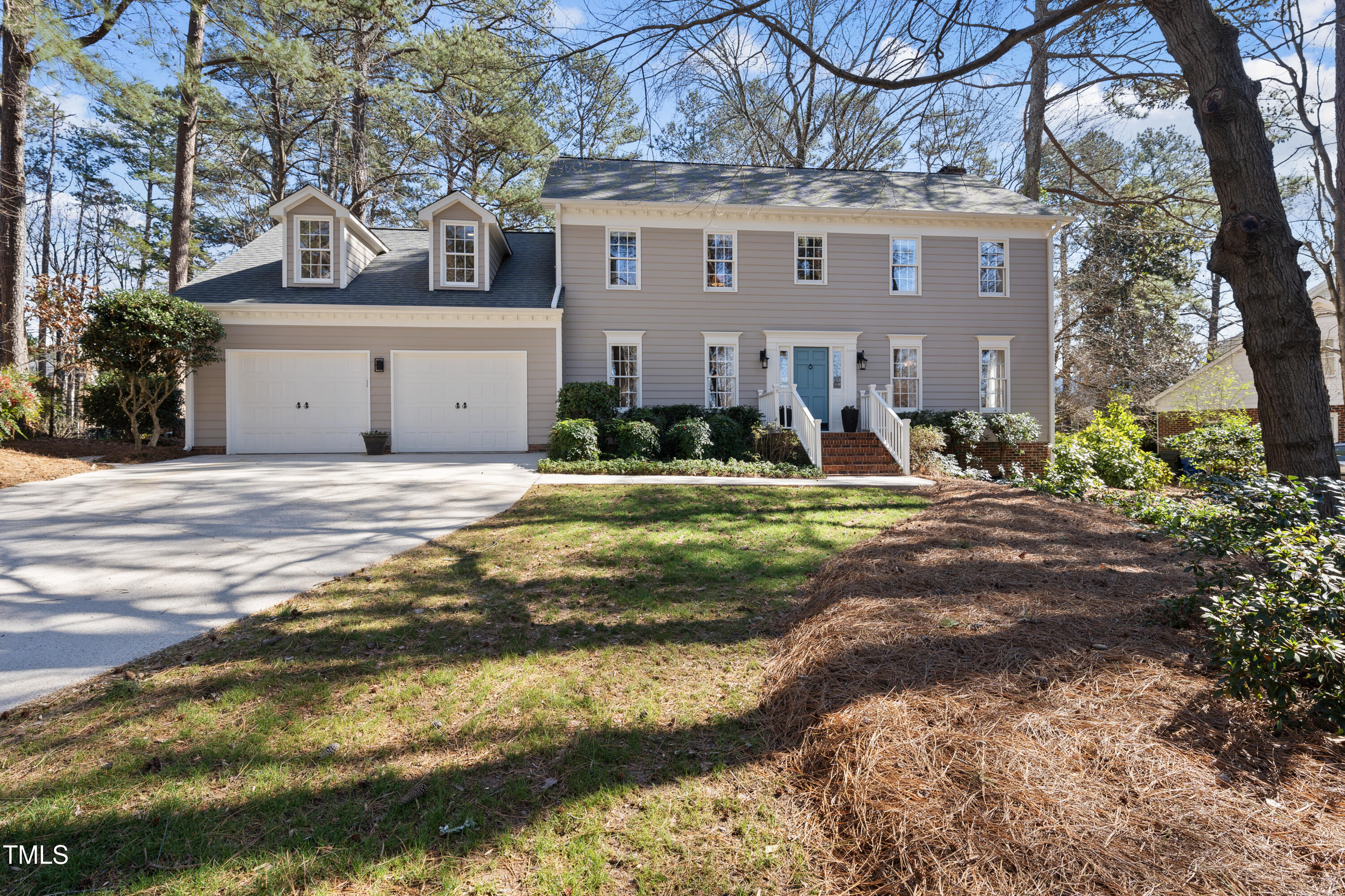 8616 Seagate Drive Raleigh, NC 27615 - Photo 1 of 56 a front view of a house with a yard