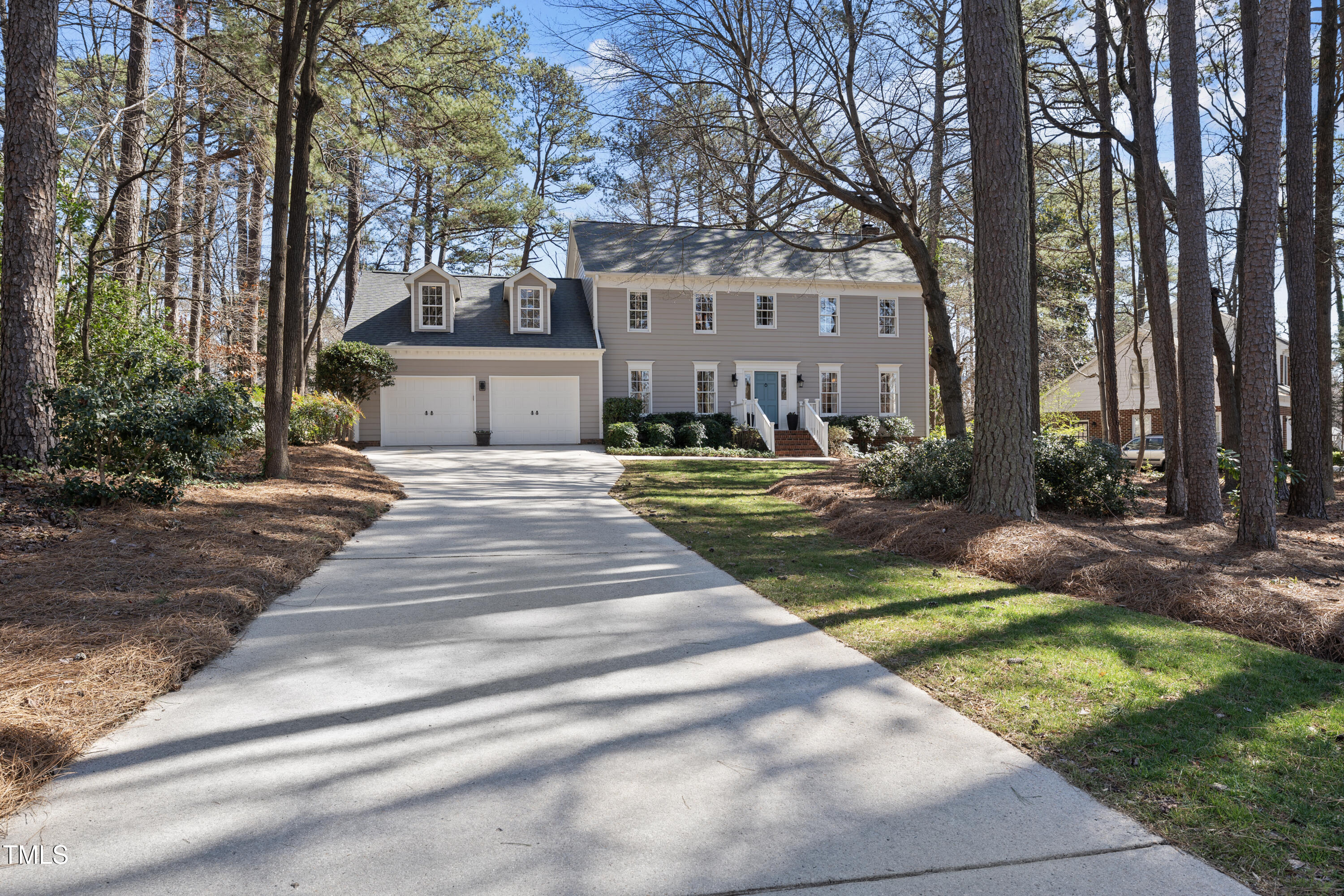 8616 Seagate Drive Raleigh, NC 27615 - Photo 2 of 56 a front view of a house with yard and green space