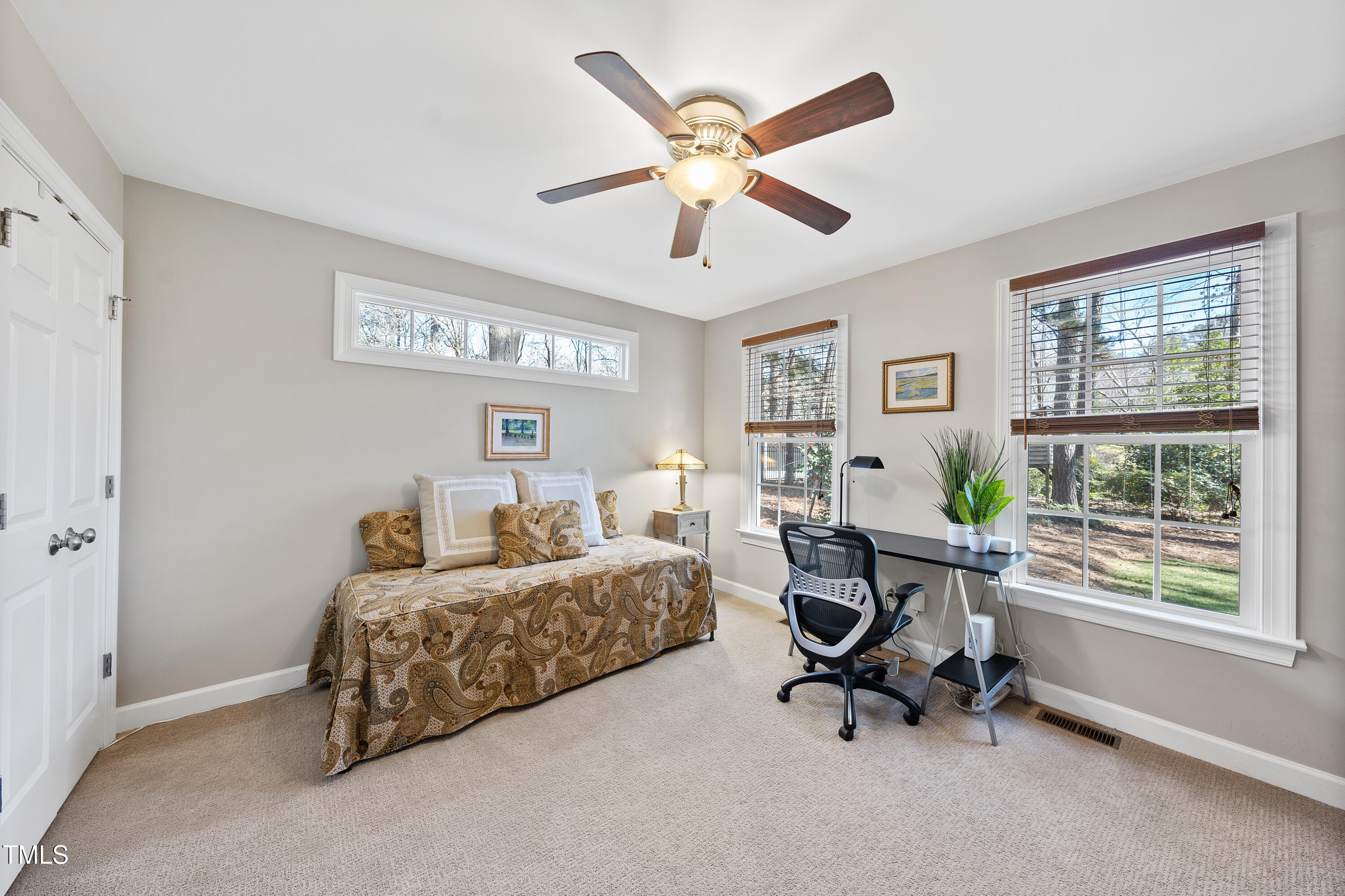 8616 Seagate Drive Raleigh, NC 27615 - Photo 26 of 56 a living room with furniture and a window
