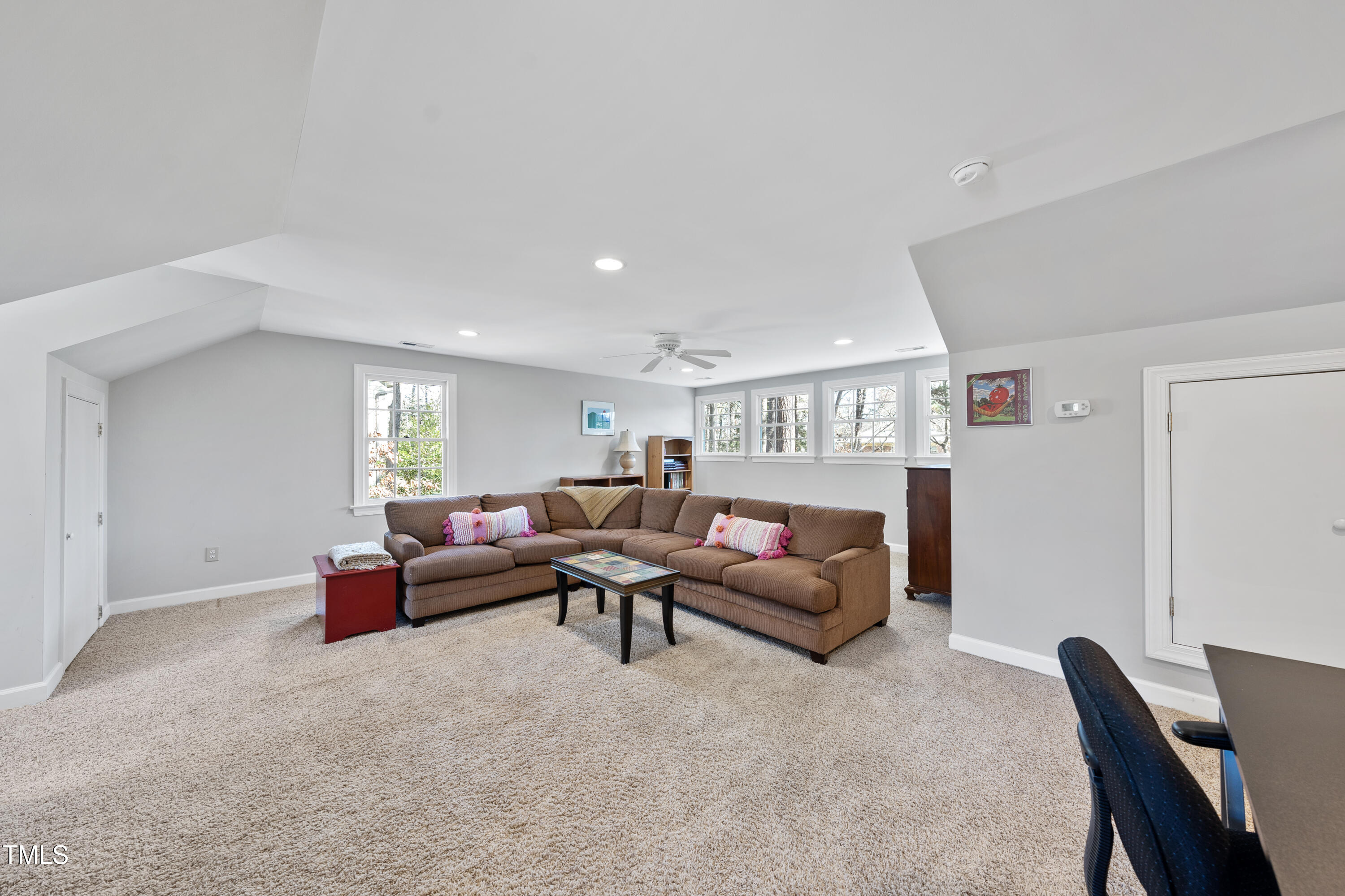 8616 Seagate Drive Raleigh, NC 27615 - Photo 41 of 56 a living room with furniture and a window