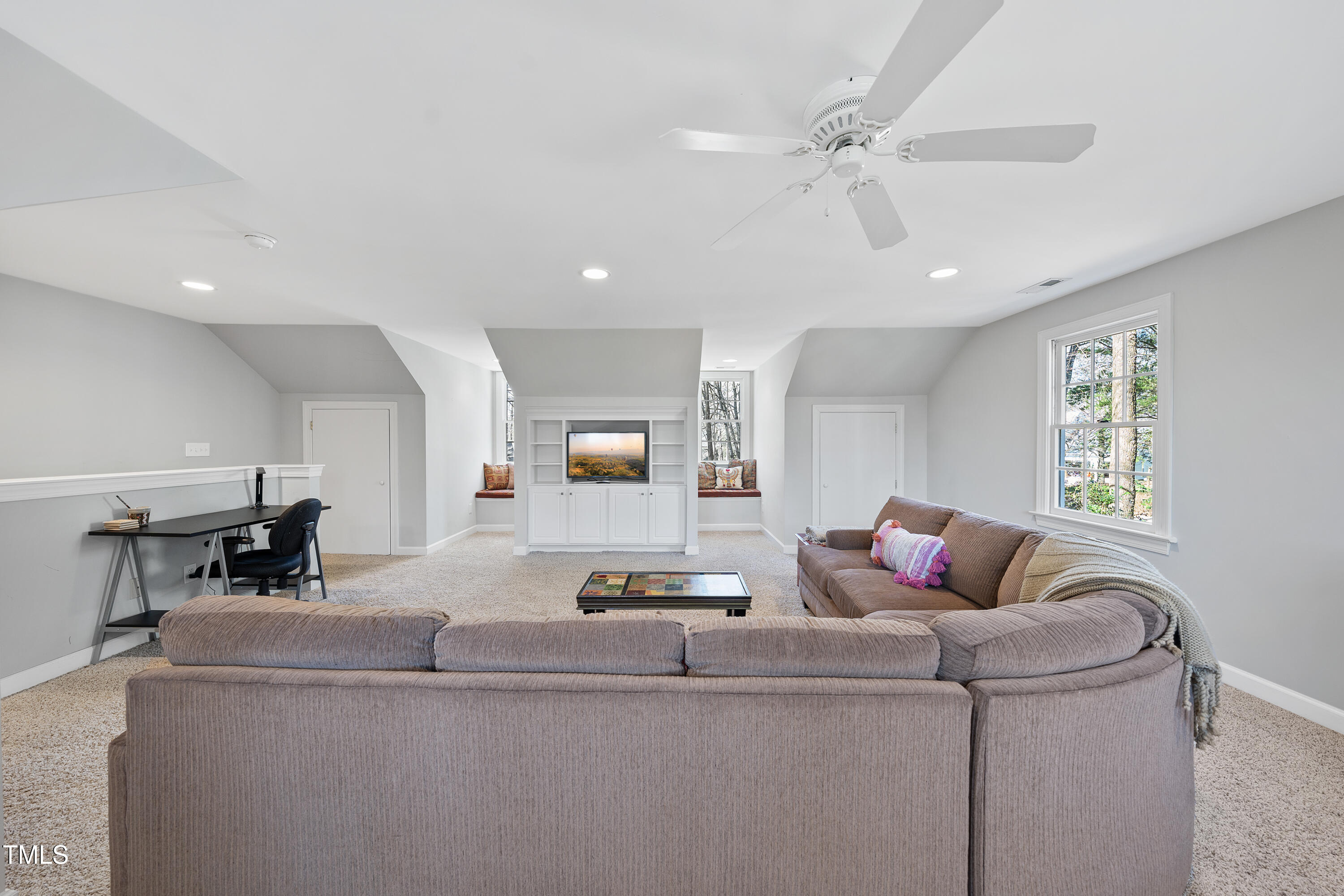 8616 Seagate Drive Raleigh, NC 27615 - Photo 43 of 56 a living room with furniture and a window