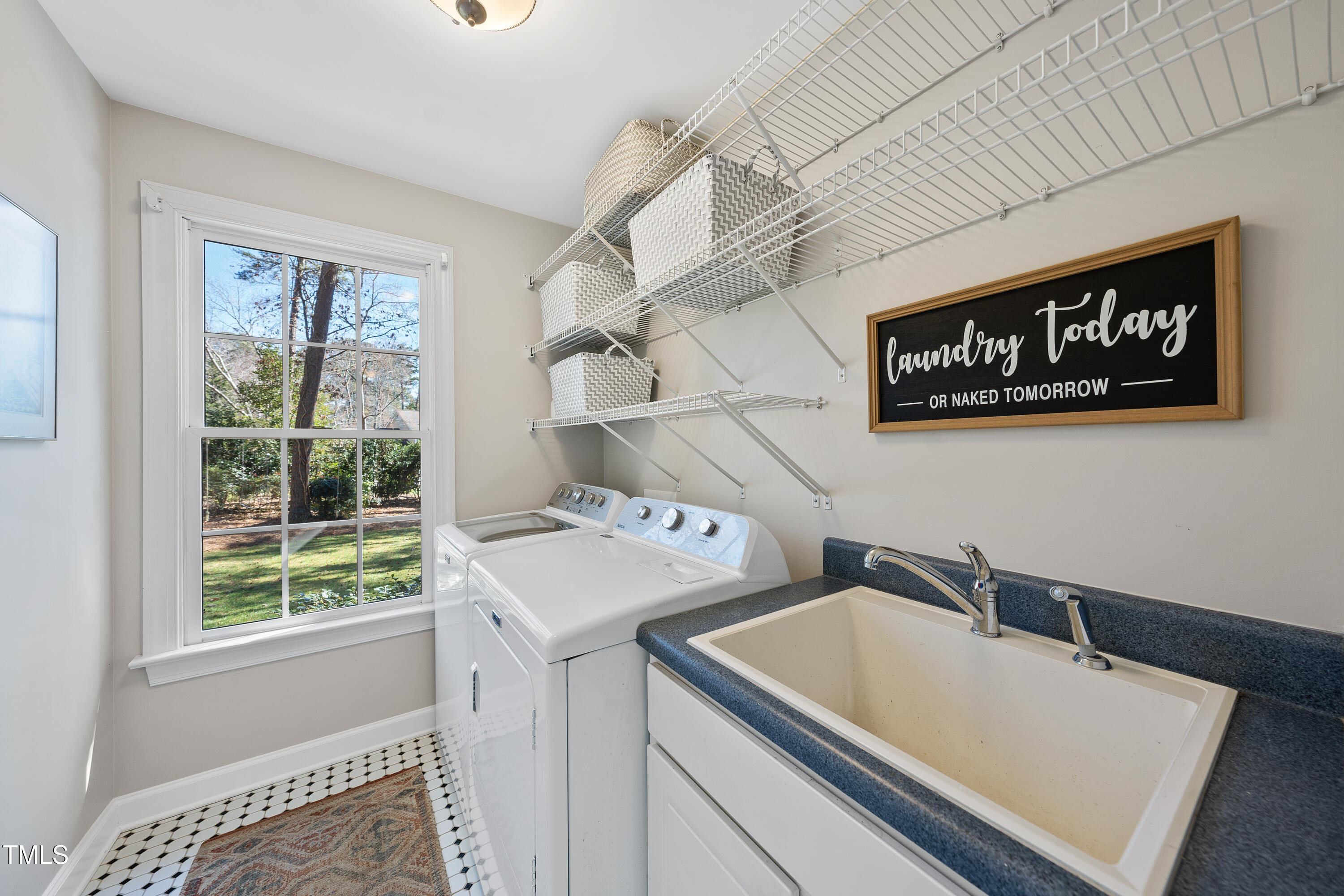 8616 Seagate Drive Raleigh, NC 27615 - Photo 44 of 56 a utility room with dryer and washer