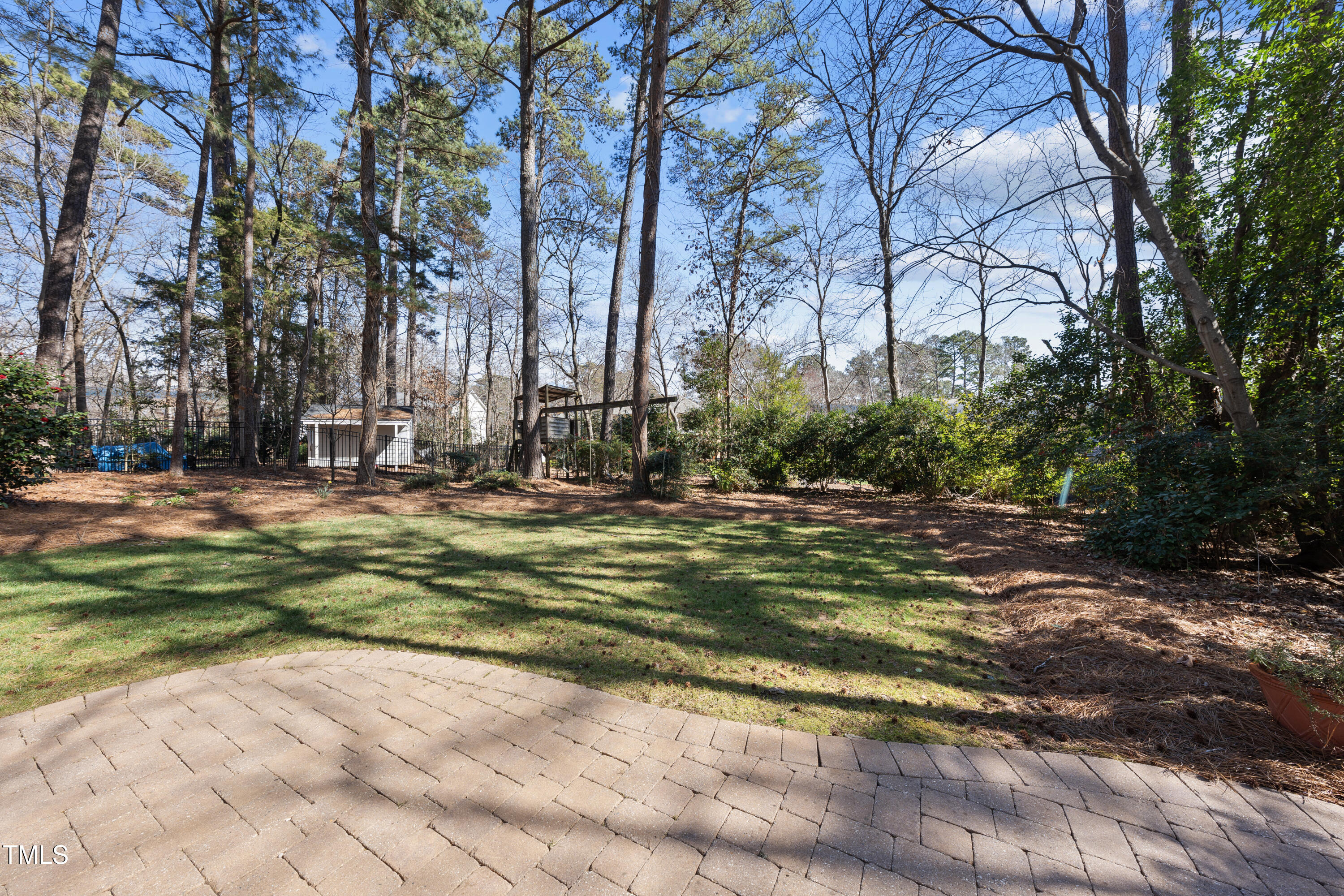 8616 Seagate Drive Raleigh, NC 27615 - Photo 51 of 56 a view of a yard with a fountain