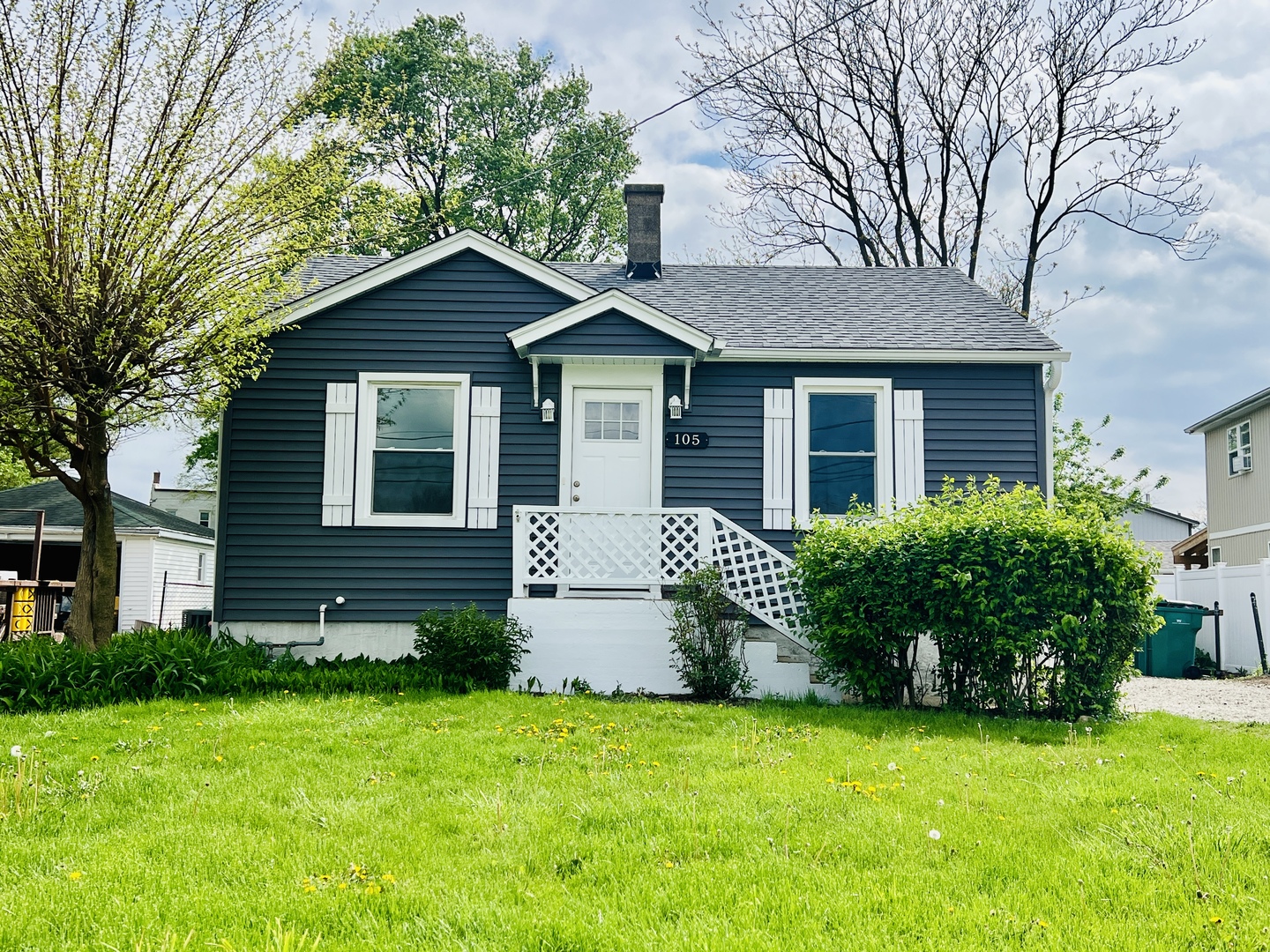 105 Prairie Avenue Manhattan, IL 60442 - Photo 1 of 1 a front view of a house with garden