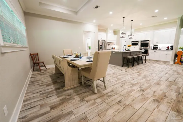 a bedroom with a bed and a chair