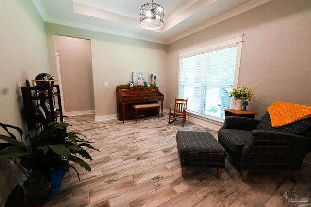 a bathroom with a granite countertop toilet a sink and a mirror