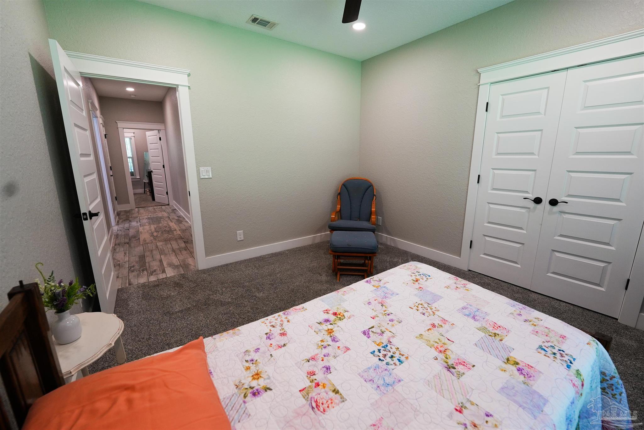 8410 Highway 97 Walnut Hill, FL 32568 - Photo 43 of 66 a bedroom with a bed and a dresser