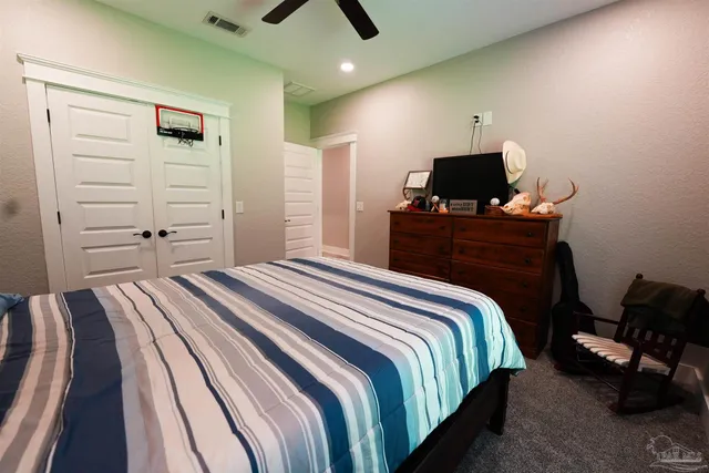 a outdoor space with lots of chairs and a fireplace