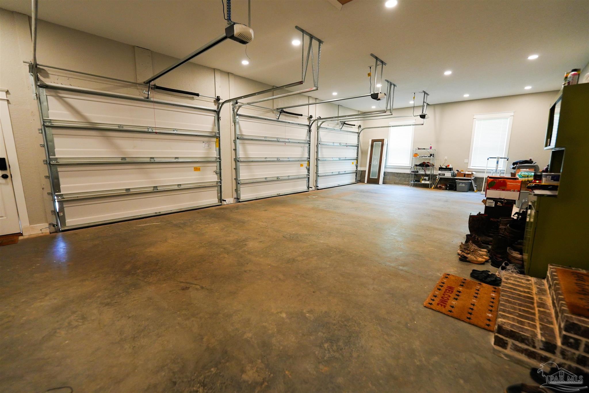 8410 Highway 97 Walnut Hill, FL 32568 - Photo 60 of 66 a view of a room with gym equipment