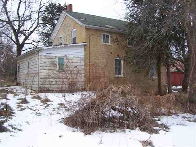 44042 Tower Road Freeport, IL 61032 - Photo 3 of 8 a view of a house covered in snow