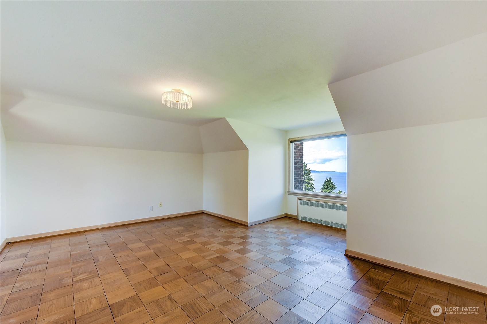 2824 Northwest 93rd Street Seattle, WA 98117 - Photo 19 of 38 an empty room with windows