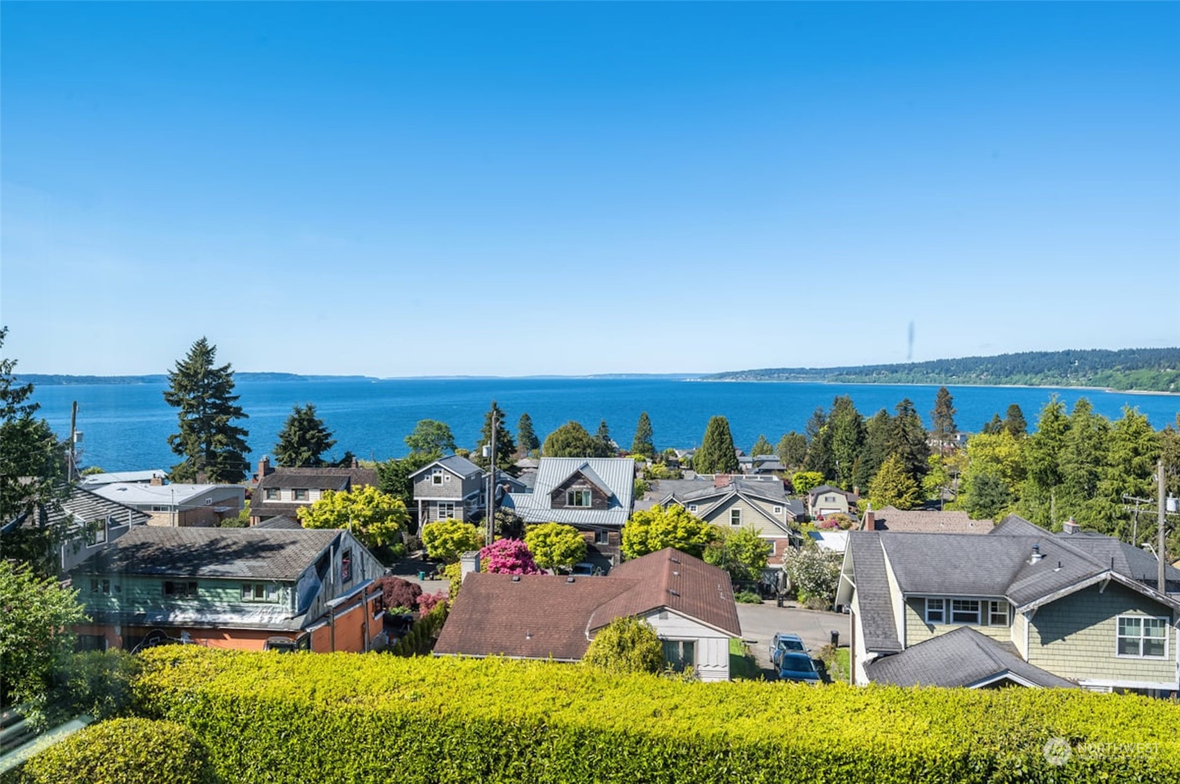2824 Northwest 93rd Street Seattle, WA 98117 - Photo 4 of 38 an aerial view of a house with a swimming pool patio and outdoor seating
