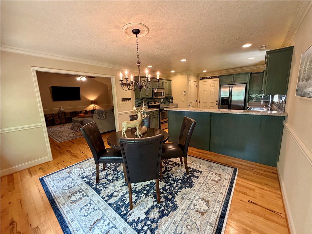 232 Hunters Trail Walhalla, SC 29691 - Photo 11 of 38 Bright and open, this kitchen offers ample counter space and connects seamlessly to the dining area.