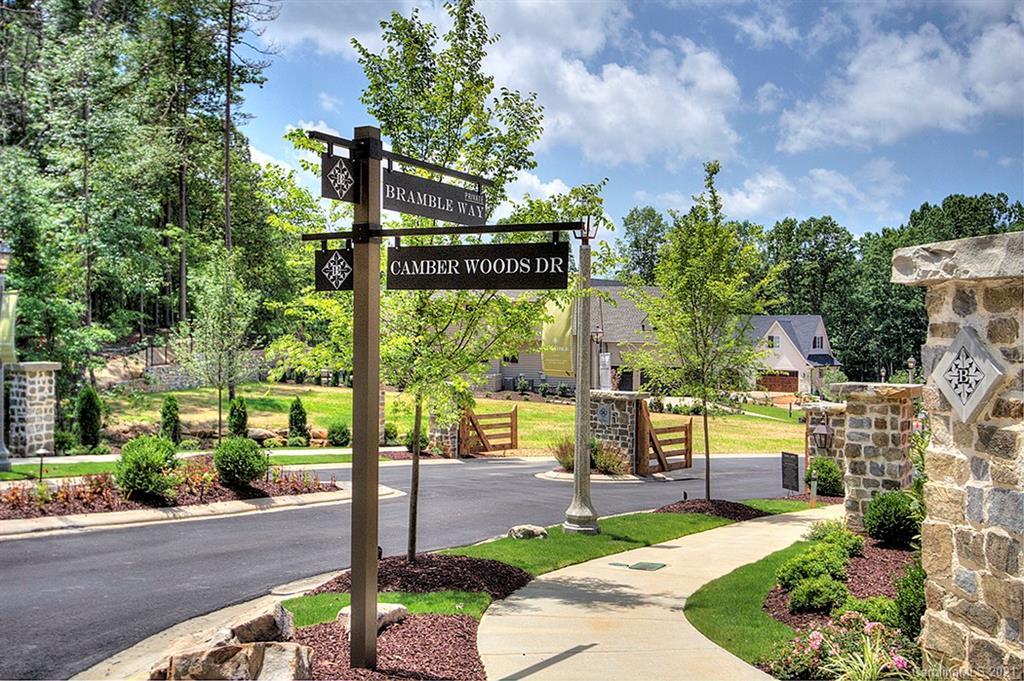419 Bramble Way, Unit 7 Fort Mill, SC 29708 - Photo 1 of 40 a sign board with a yard in the back