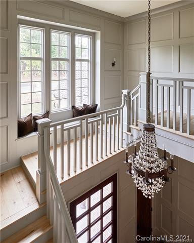 419 Bramble Way, Unit 7 Fort Mill, SC 29708 - Photo 14 of 40 a view of a porch with wooden floor