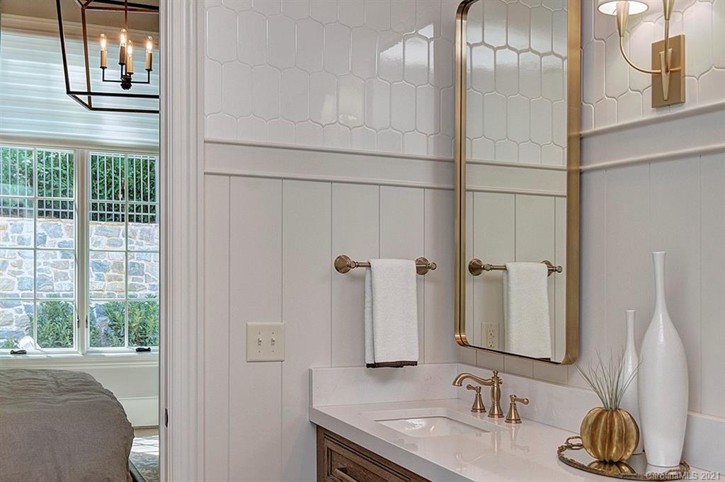 419 Bramble Way, Unit 7 Fort Mill, SC 29708 - Photo 24 of 40 a bathroom with a double vanity sink and a mirror
