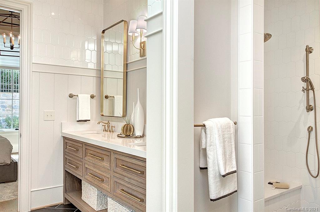 419 Bramble Way, Unit 7 Fort Mill, SC 29708 - Photo 25 of 40 a bathroom with a double vanity sink mirror and shower