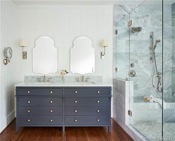 419 Bramble Way, Unit 7 Fort Mill, SC 29708 - Photo 30 of 40 a bathroom with a granite countertop sink mirror and shower