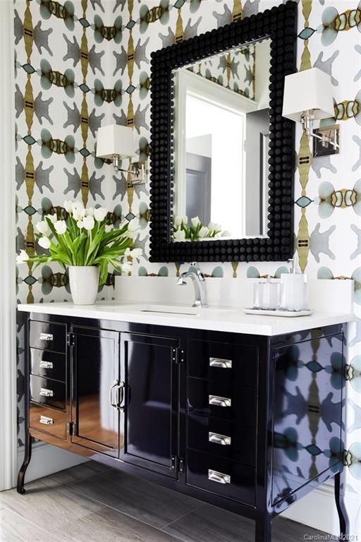 419 Bramble Way, Unit 7 Fort Mill, SC 29708 - Photo 32 of 40 a bathroom with a sink and a mirror