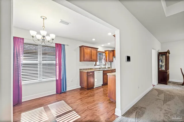 a view of a kitchen with a sink and dishwasher kitchen view
