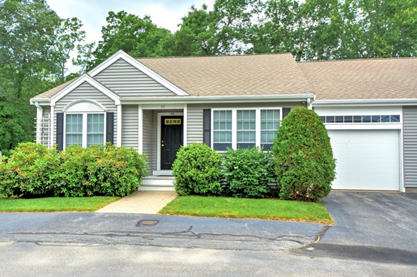 99 Stow Road, Unit 99 Boxborough, MA 01719 - Photo 1 of 27 a view of outdoor space yard and front view of a house