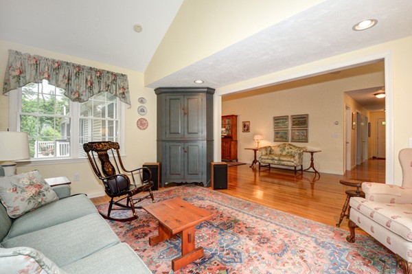 99 Stow Road, Unit 99 Boxborough, MA 01719 - Photo 11 of 27 a living room with furniture and large windows