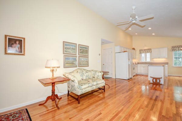 99 Stow Road, Unit 99 Boxborough, MA 01719 - Photo 12 of 27 a living room with furniture and a table