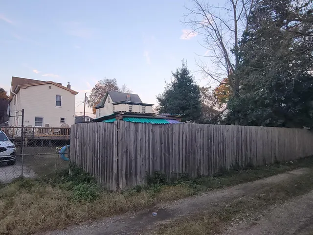 a view of a deck with a yard