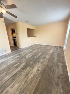 6702 Everhart Road, Unit A107 Corpus Christi, TX 78413 - Photo 2 of 13 a view of empty room with wooden floor