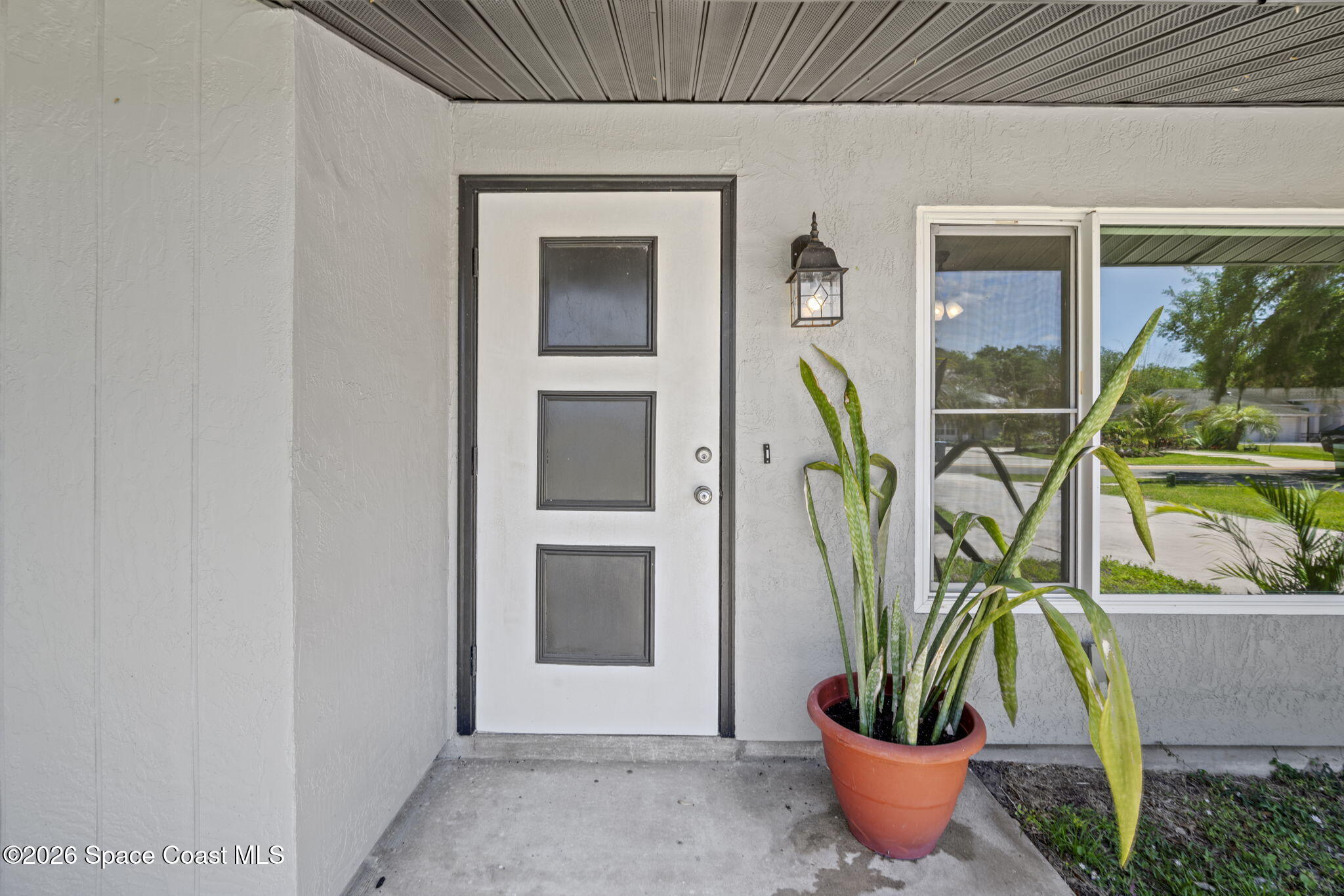 721 Riviera Drive Northeast Palm Bay, FL 32905 - Photo 2 of 33 3-web-or-mls-RIVIERA.87