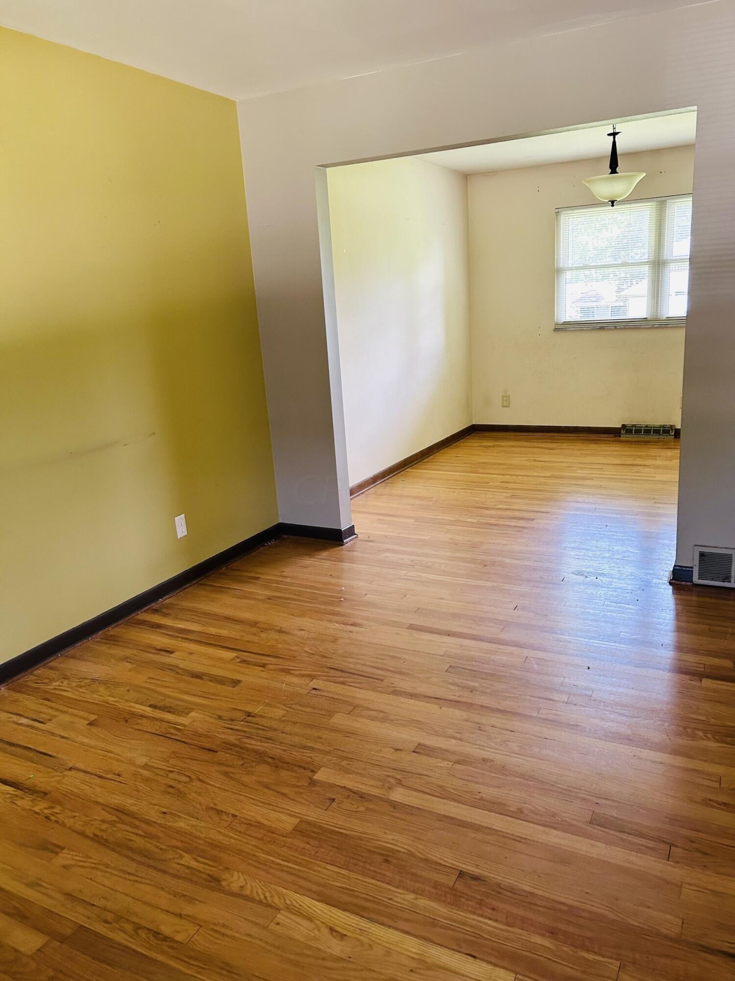 279 Dunbarton Road Columbus, OH 43230 - Photo 3 of 4 wood flooring in entry level and under most carpeting