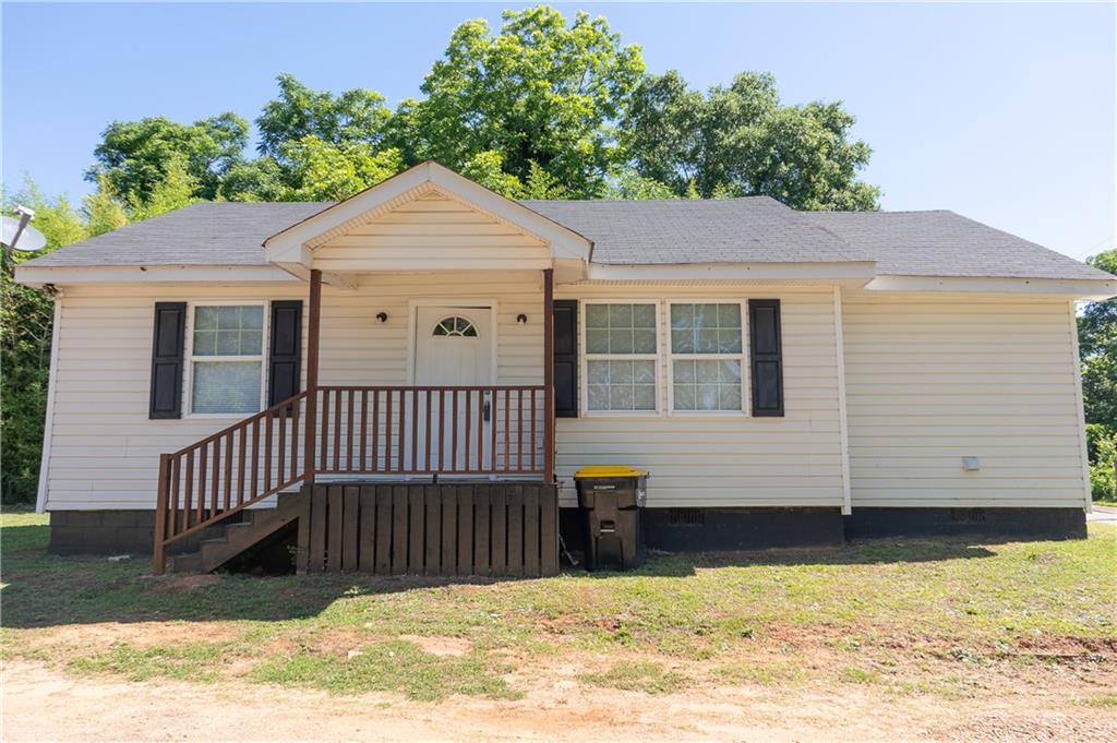 53 Washington Drive Forsyth, GA 31029 - Photo 1 of 19 a view of a house with a yard