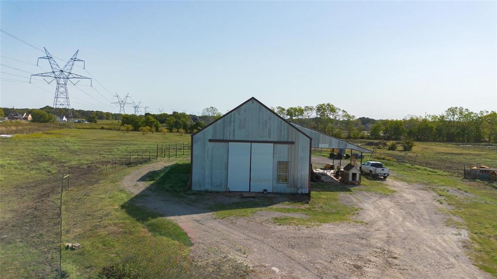 1705 Stinson Road Lucas, TX 75002 - Photo 2 of 4 a view of a backyard