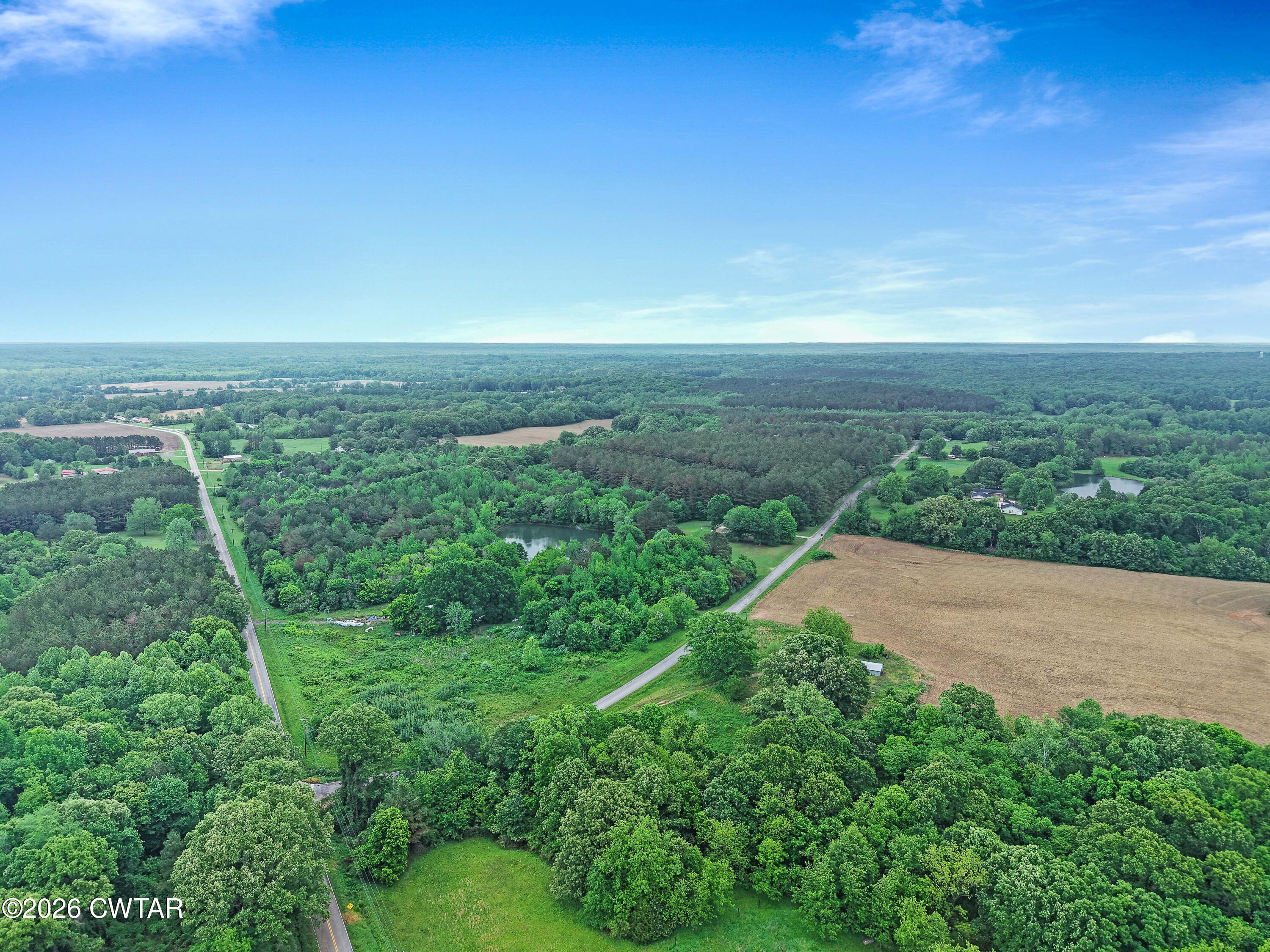 1525 Mill Creek Road Cedar Grove, TN 38321 - Photo 8 of 15 a view of a field with an ocean