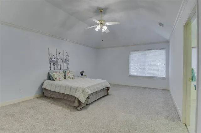 a spacious bathroom with a granite countertop sink mirror and bathtub
