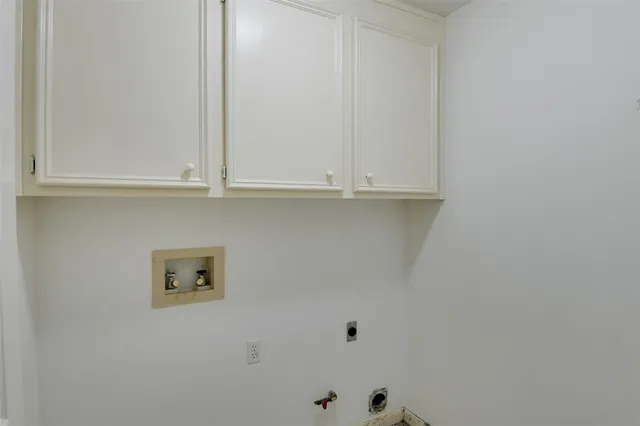 a big house with a big yard and large trees