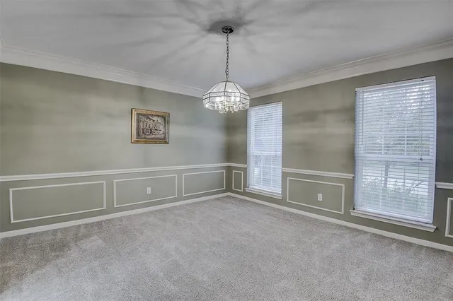 a view of a livingroom with furniture and a fireplace