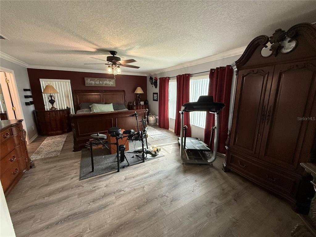 4780 Barbados Loop Clermont, FL 34711 - Photo 15 of 23 a view of a livingroom with furniture and a window