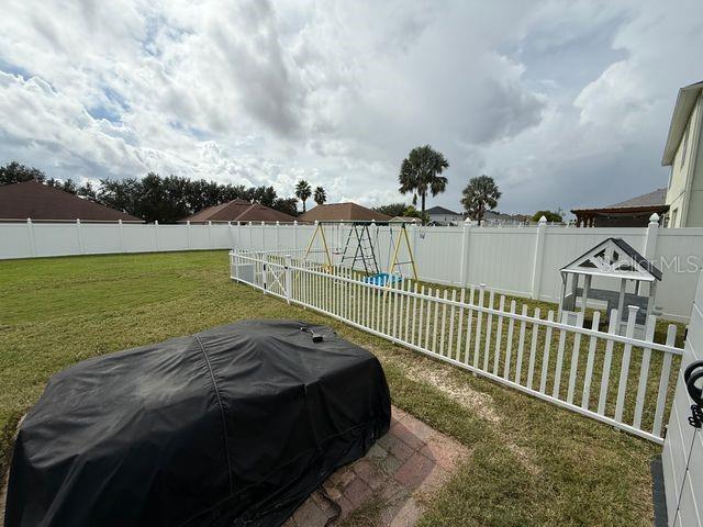 4780 Barbados Loop Clermont, FL 34711 - Photo 22 of 23 a view of a balcony with an ocean view