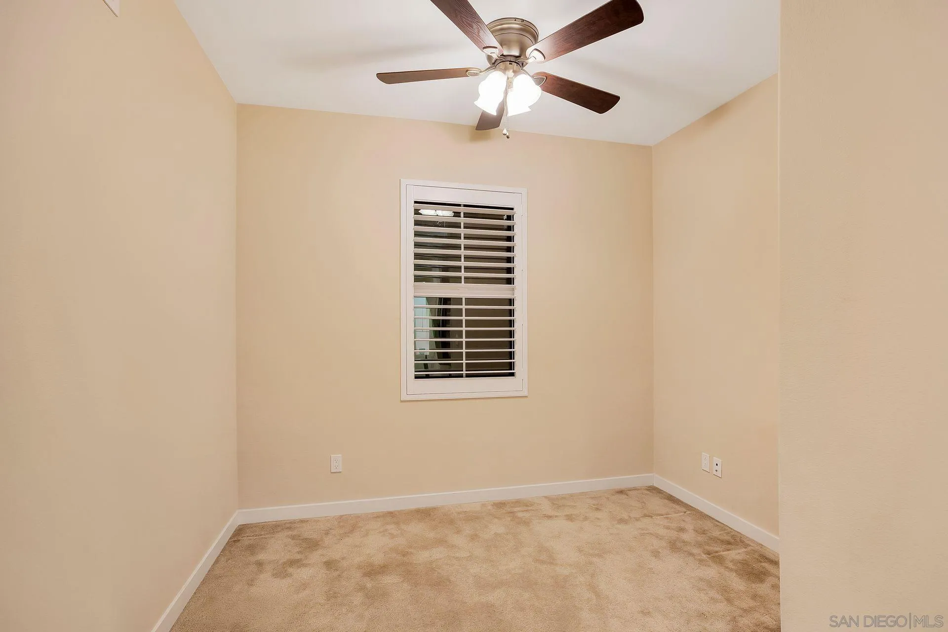 2236 Indus Way San Marcos, CA 92078 - Photo 13 of 30 an empty room with a window and a fan