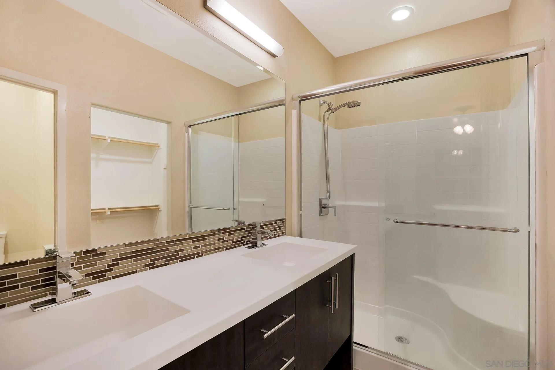 2236 Indus Way San Marcos, CA 92078 - Photo 19 of 30 a bathroom with a sink and a mirror