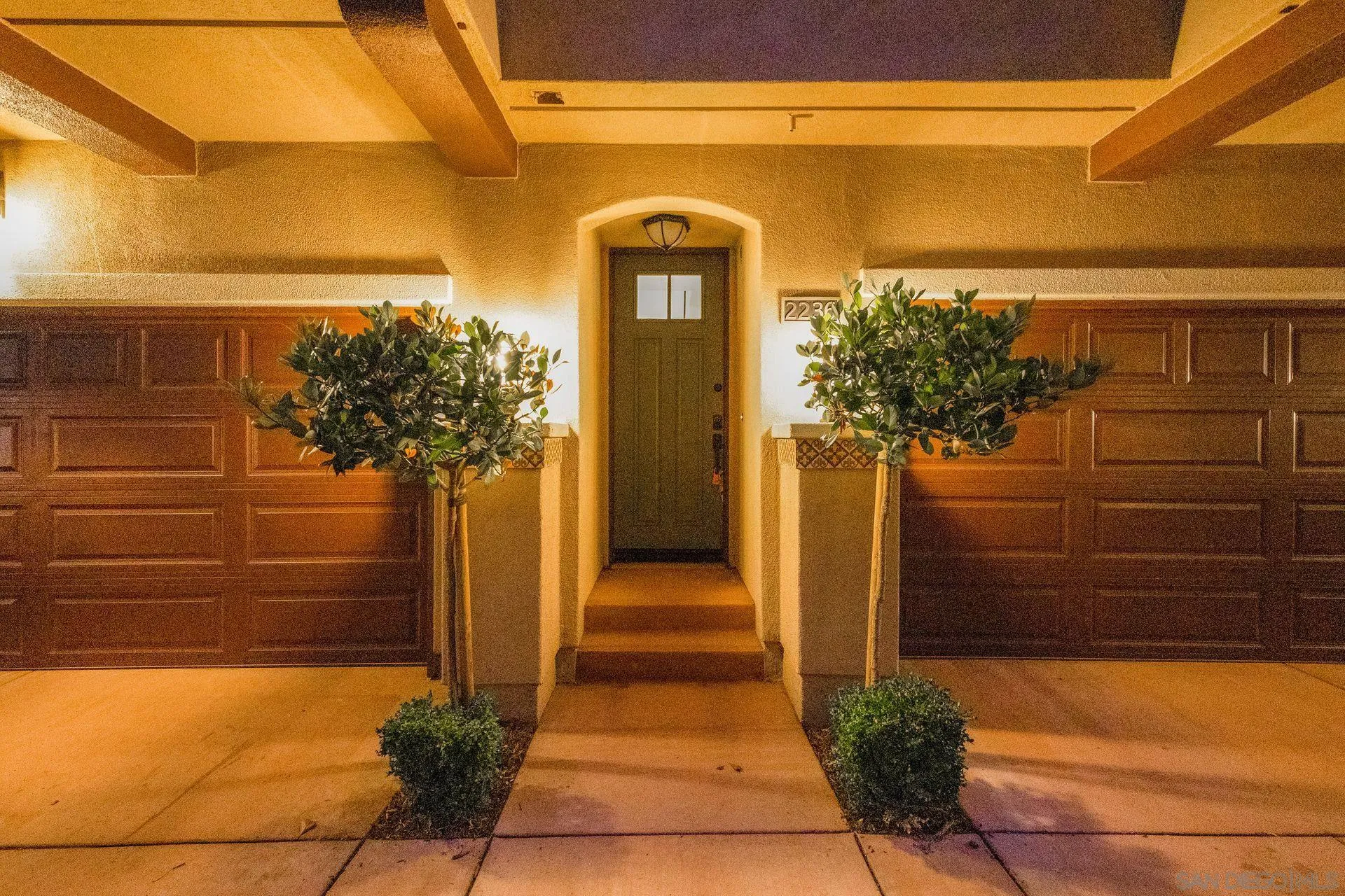 2236 Indus Way San Marcos, CA 92078 - Photo 4 of 30 a front view of a house with a yard