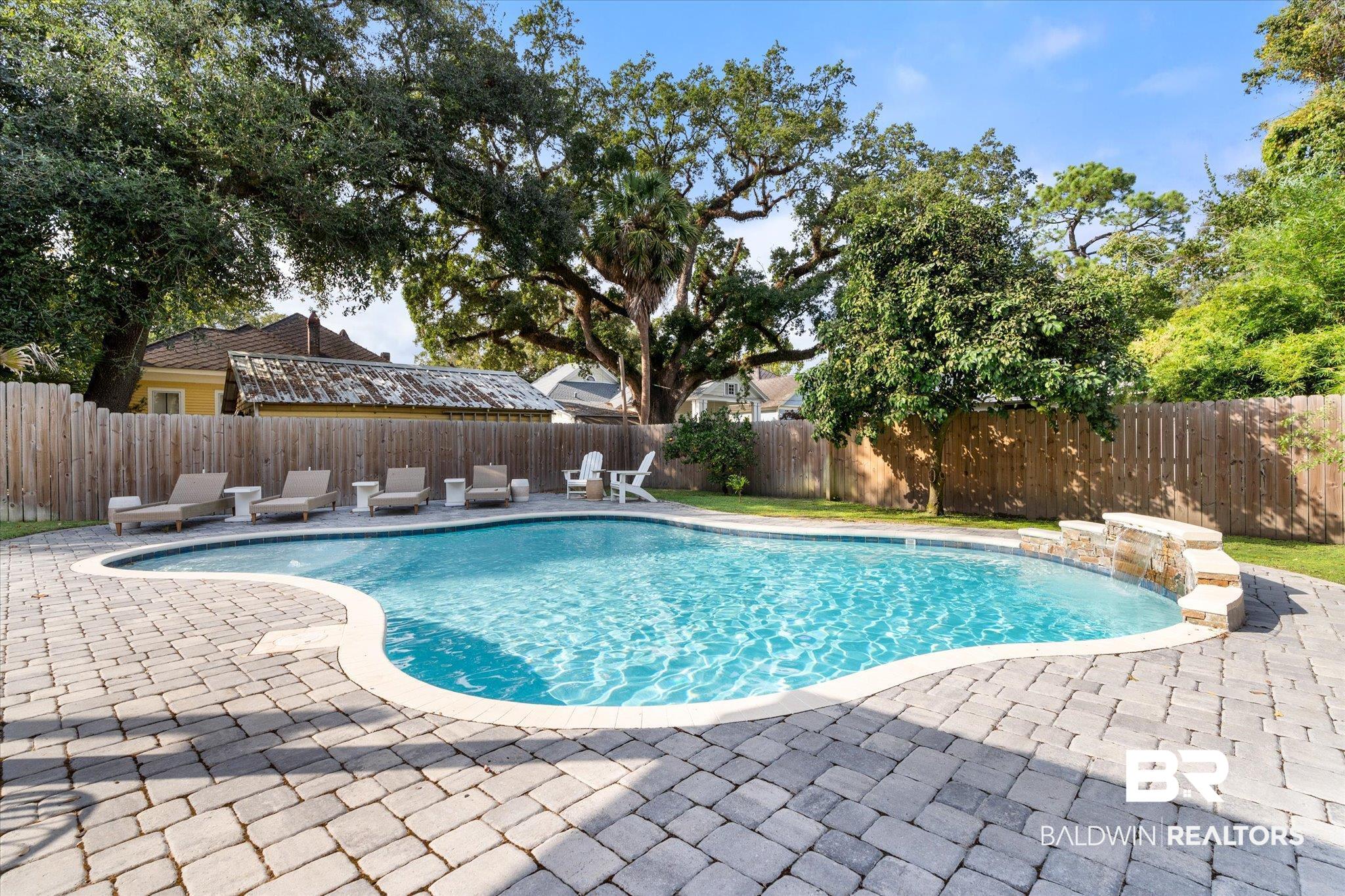1210 Government Street Mobile, AL 36604 - Photo 24 of 37 View of pool with a patio and pool water feature