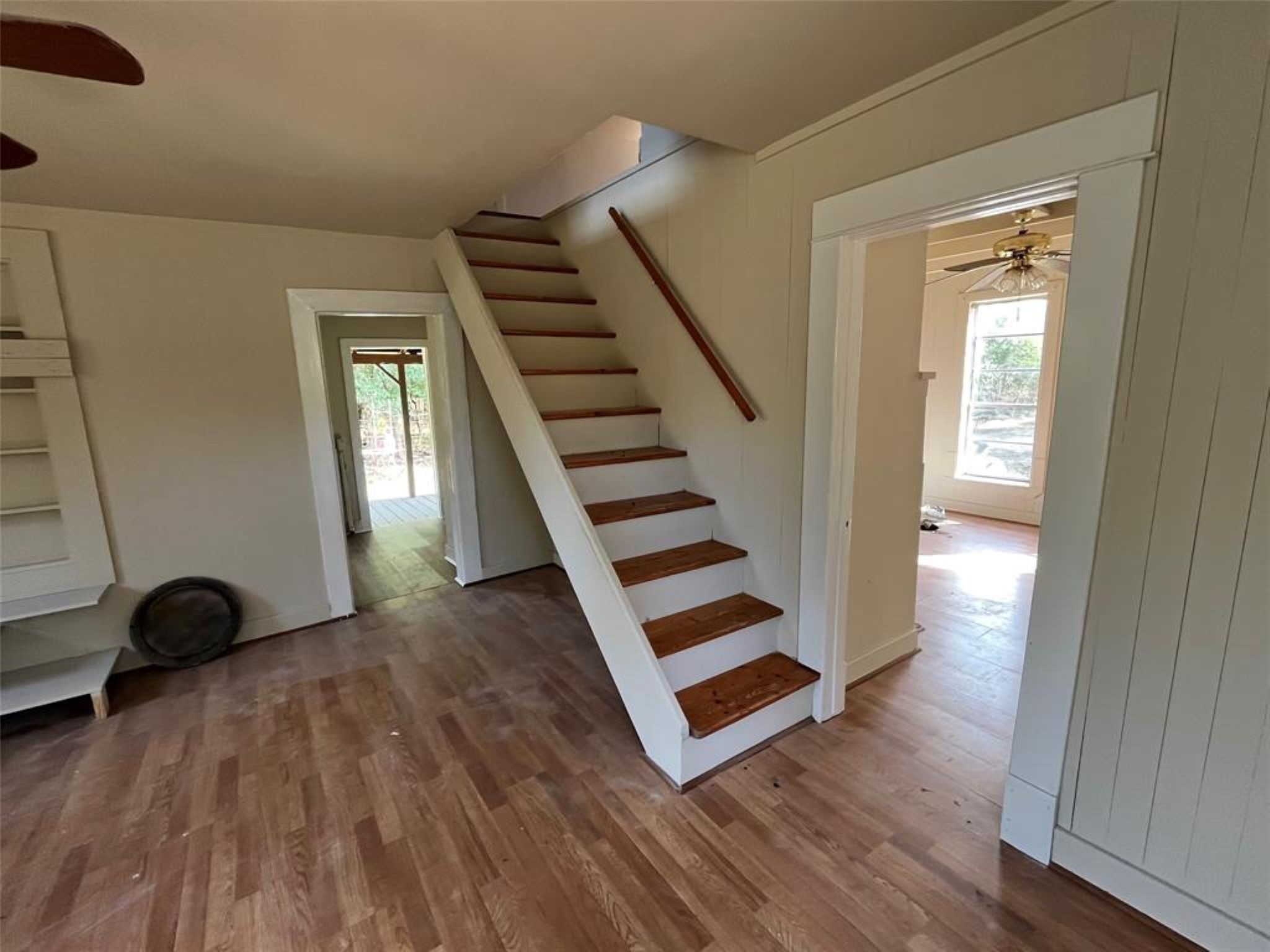 11712 FM 1458 Road Sealy, TX 77474 - Photo 4 of 13 a view of front door with wooden floor and stairs