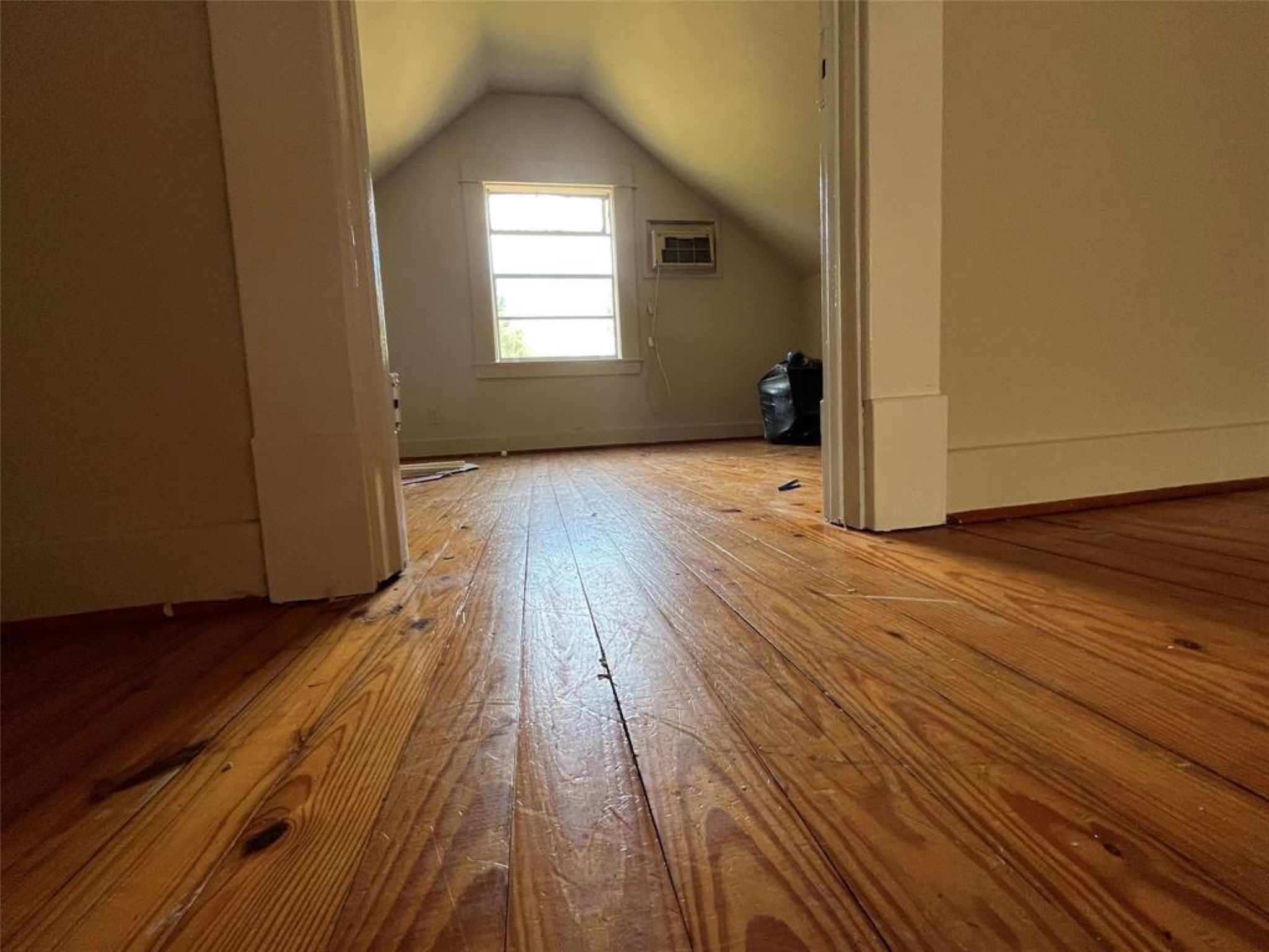 11712 FM 1458 Road Sealy, TX 77474 - Photo 8 of 13 a view of empty room with wooden floor and fan