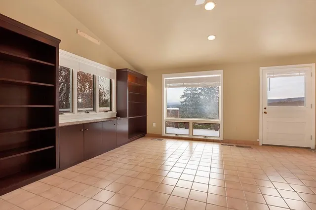 a bathroom with a double vanity sink and mirror