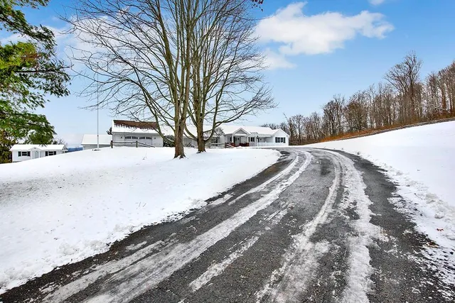 a street view covered with snow