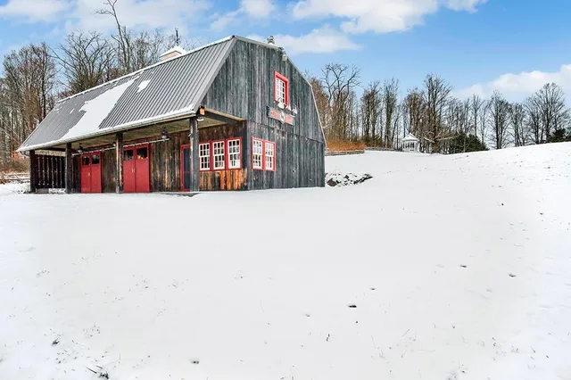 a view of a patio with a yard